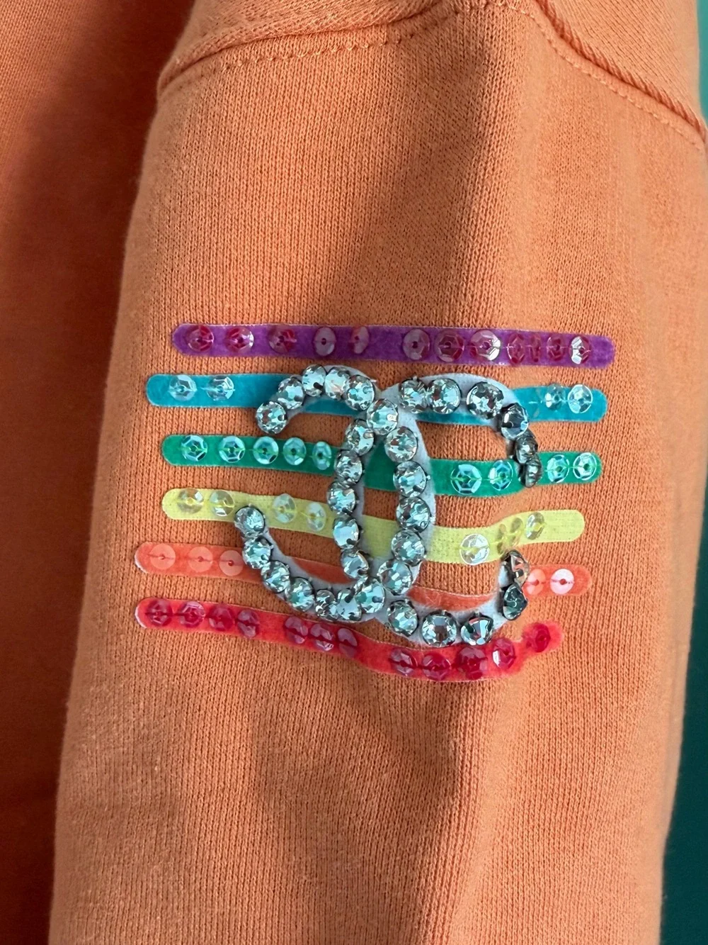 CHANEL Pharrell Orange Embellished Logo Hoodie Sweatshirt
